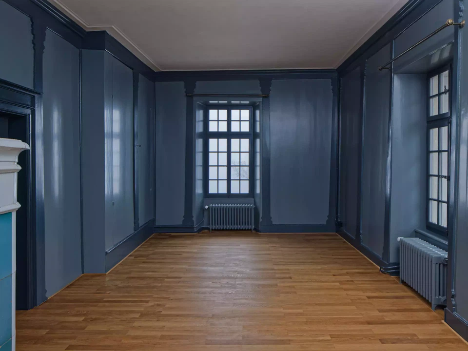 Südzimmer Obergeschoss, blaue Täfer mit Riemenboden