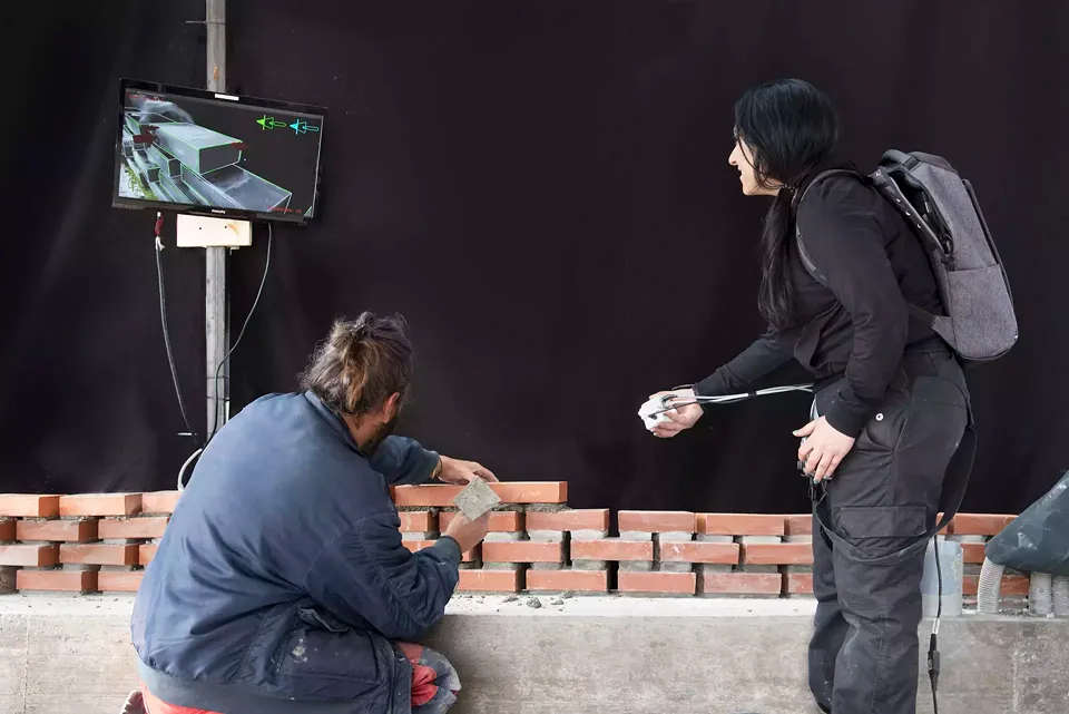 Construction process with optical guidance system for the placement of bricks, Kitrvs Winery, Gramazio Kohler Research, ETH Zurich, 2019