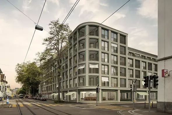 Aussenbild des Apartmenthotels mit Café und Buchladen im Erdgeschoss