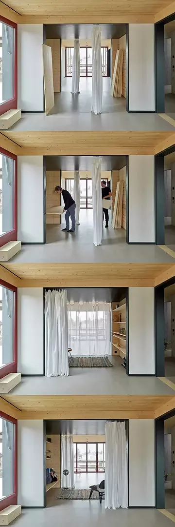 Eine Mittelzone mit abgehängter Decke und Vorhängen zoniert den Grundriss und ermöglicht je nach Bedürfnis der MieterInnen eine flexible Nutzung als Bücherregal, Homeoffice oder Schlafnische.