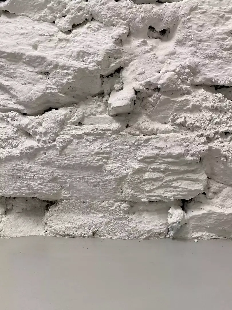 Détails mur baunderie