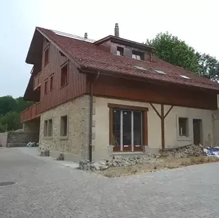Transformation d'une ferme en habitation à trois logements