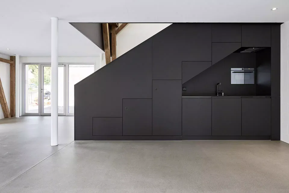 Conversion de la grange aux immeubles de bureaux et commerciaux
