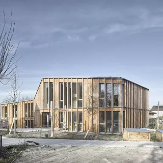 Kindertagesstätte und Renovation einer Scheune