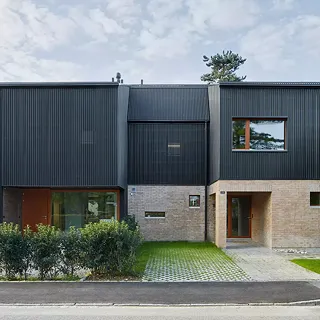 Aufstockung und Anbau dreier Wohnhäuser