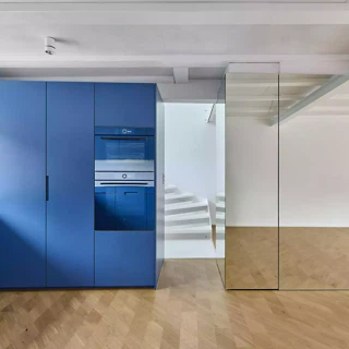 Transformation d'une maison mitoyenne dans la Bachtobelstrasse