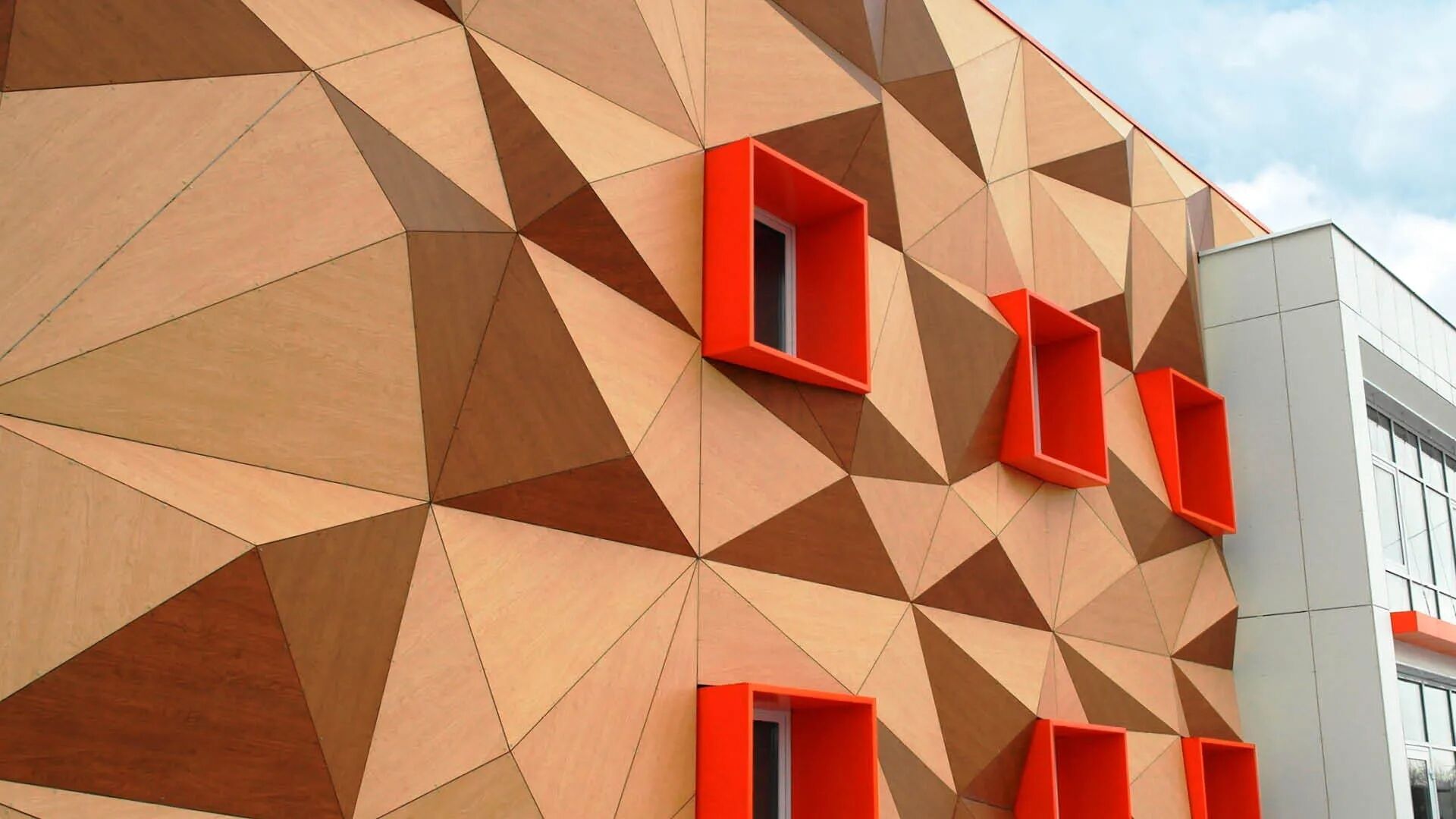 Rockpanel Plattenmaterial erlaubt eine freie Gestaltung der Fassade: Flexible Abmessungen, richtungsungebunden, schmale Fugen, sogar gewölbt oder gebogen. Rockpanel Plattenmaterial erlaubt eine freie Gestaltung der Fassade: Flexible Abmessungen, richtungsungebunden, schmale Fugen, sogar gewölbt oder gebogen.